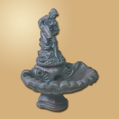 Small one-tier fountain with a statue of a boy fishing.