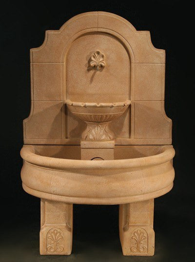 Provincial outdoor wall fountain with basin and pedestals
