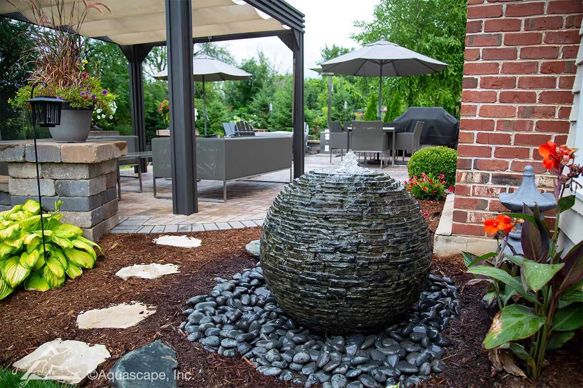 Stacked Slate Spheres fountain with water flowing