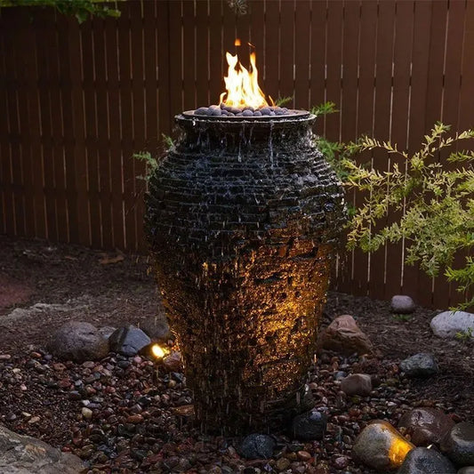 Large stacked slate urn with fire and water feature.