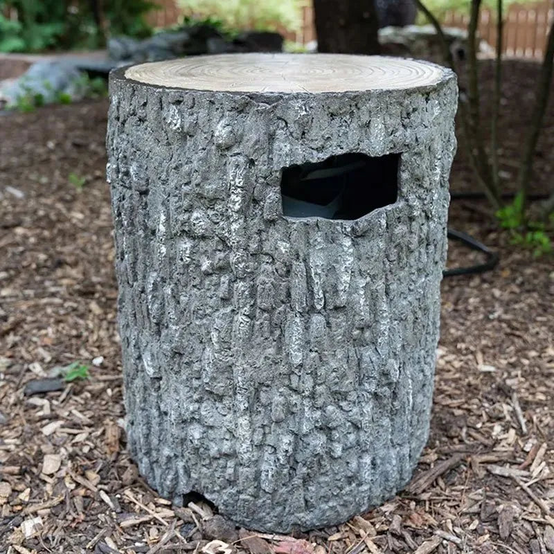 Faux stump propane tank cover on a patio