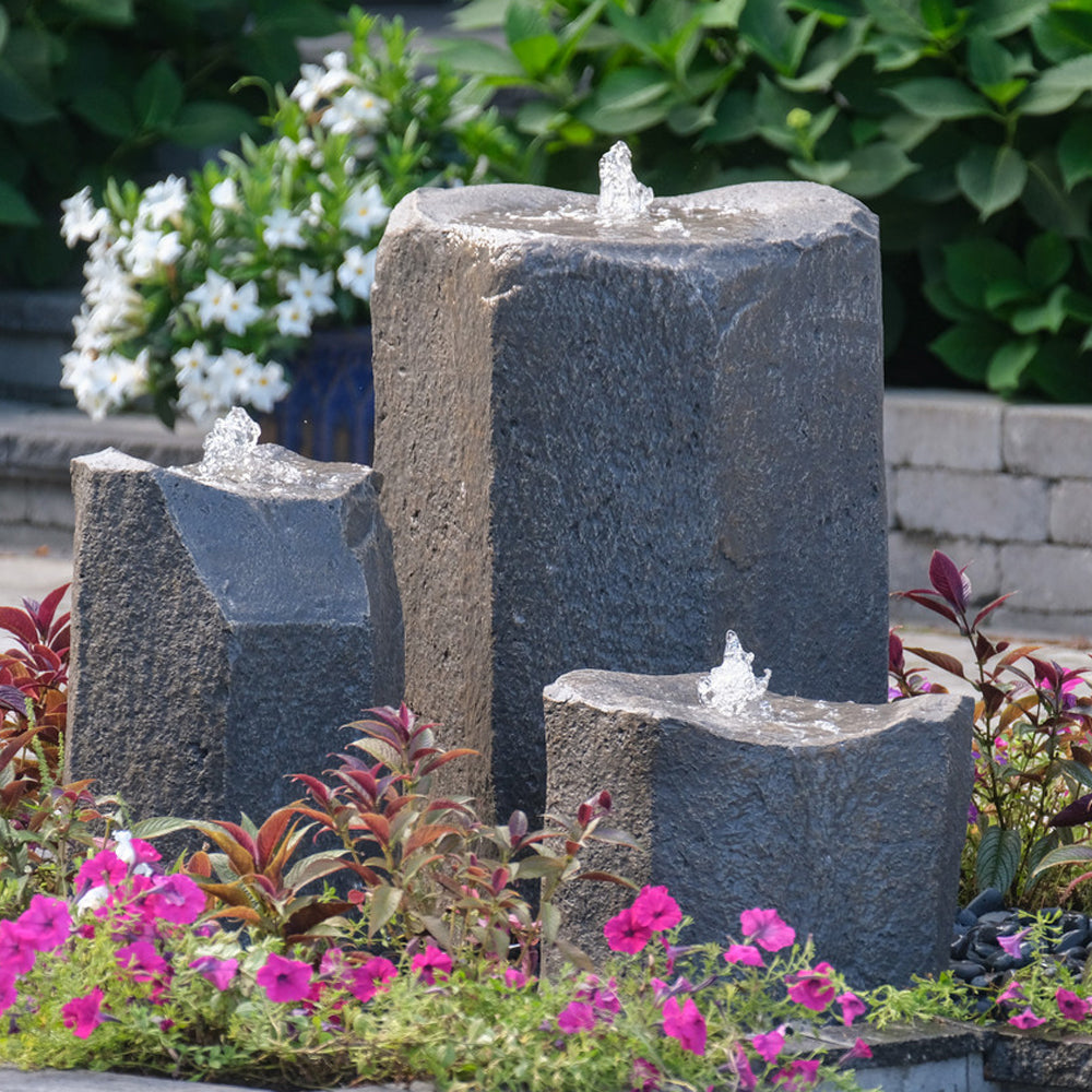 Triple-tiered stone bird bath fountain