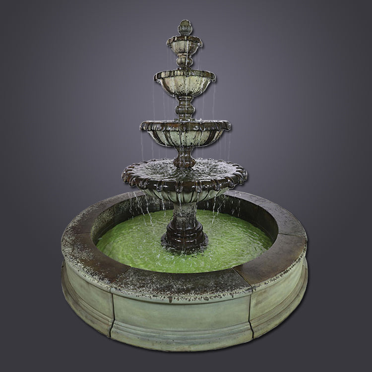 Large four-tier fountain with a regal chateau design, suitable for a pond.