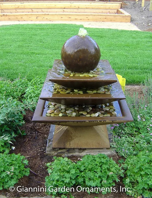 Shallow three-tier tapered square fountain.