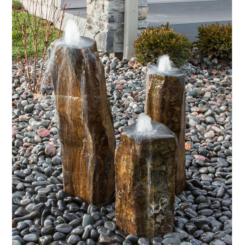 Triple-tiered basalt column fountain with polished top bowls.